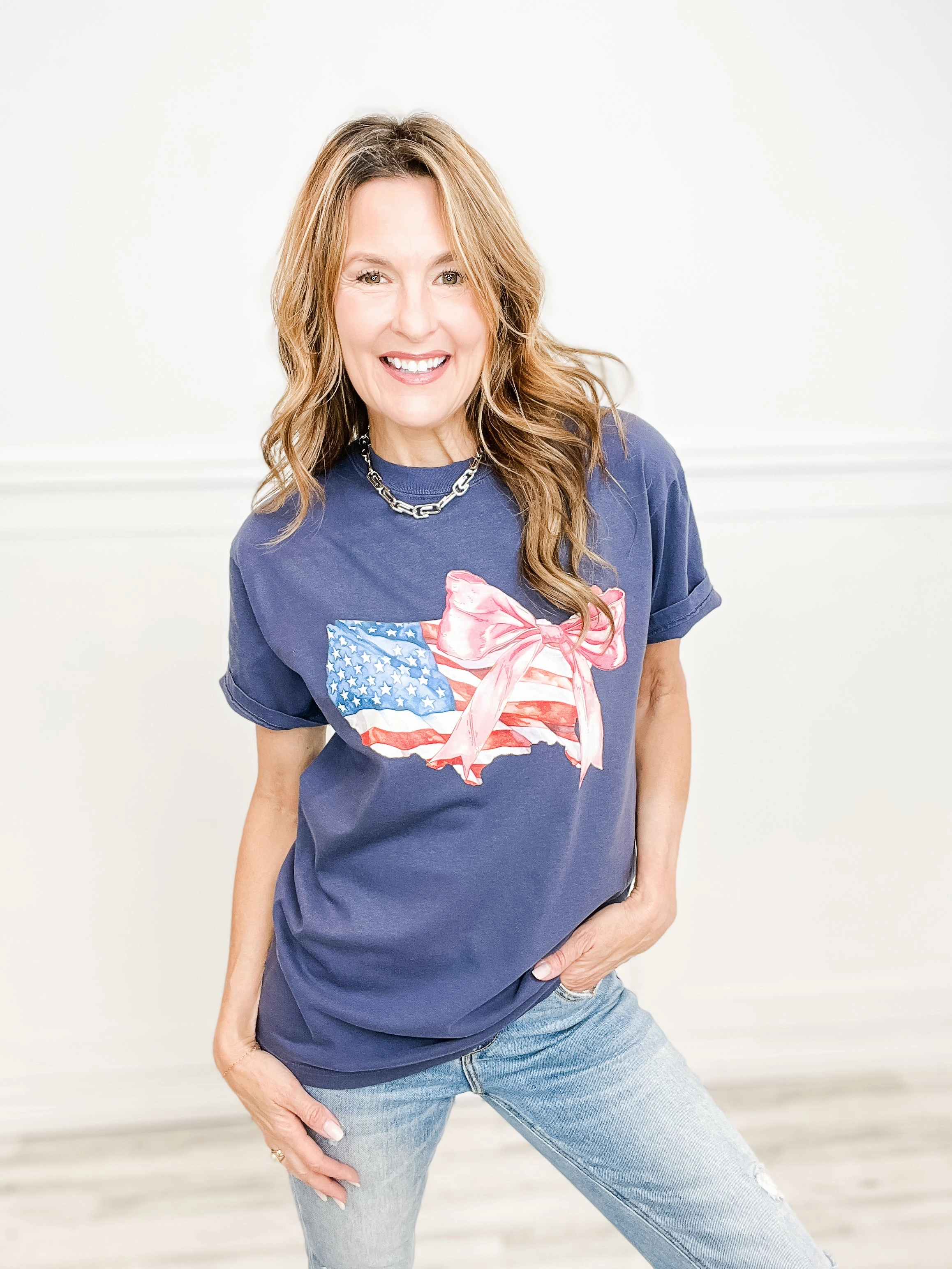 DoubleStitched Hemming America The Beautiful With a Bow Graphic Tee