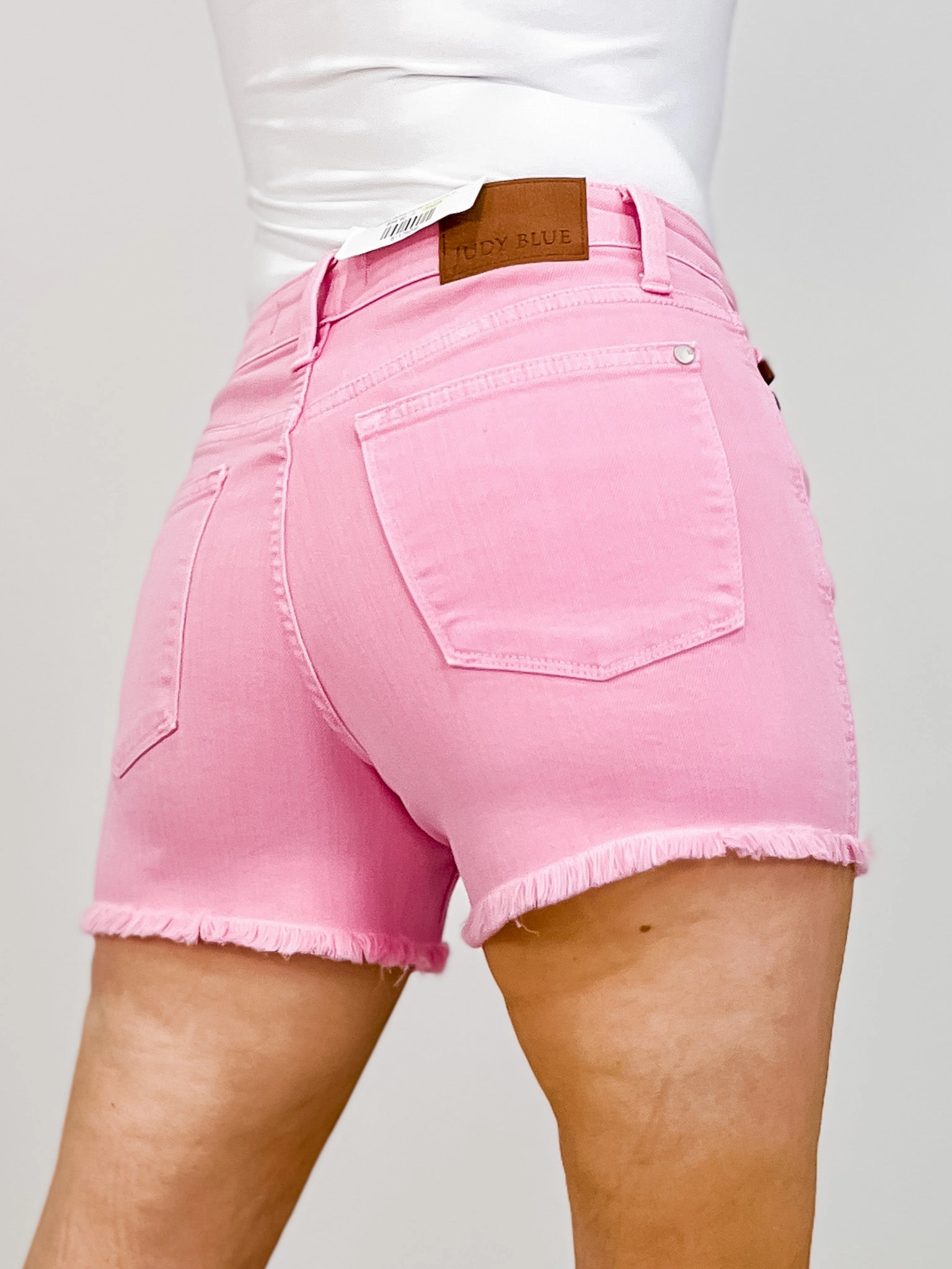 Go-to Comfort Soft Stretch Judy Blue Mid-Rise Pink Garment Dyed Fray Hem Shorts