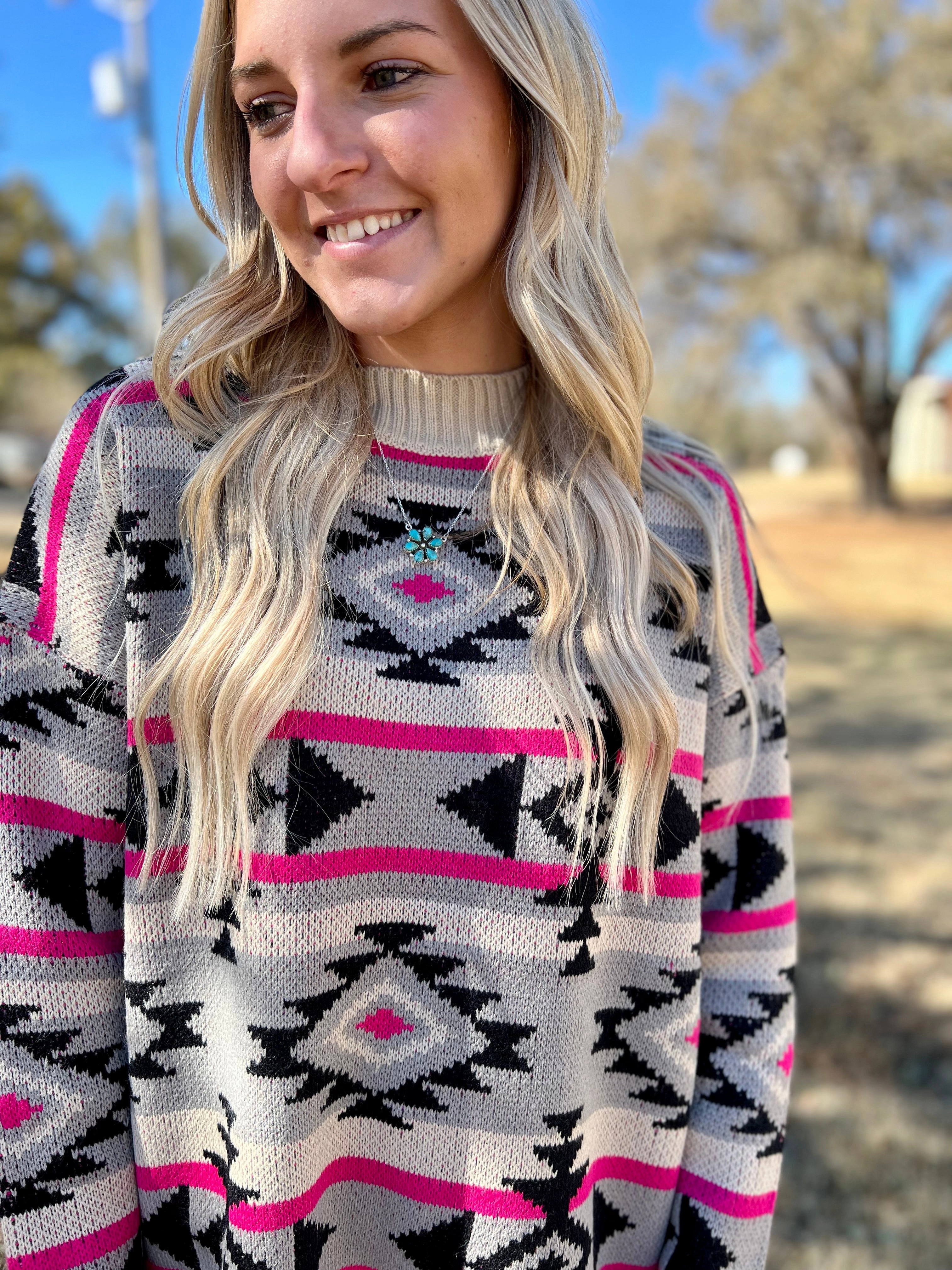 NonRestrictiveSilhouette Black And Pink Aztec Knitted Sweater*
