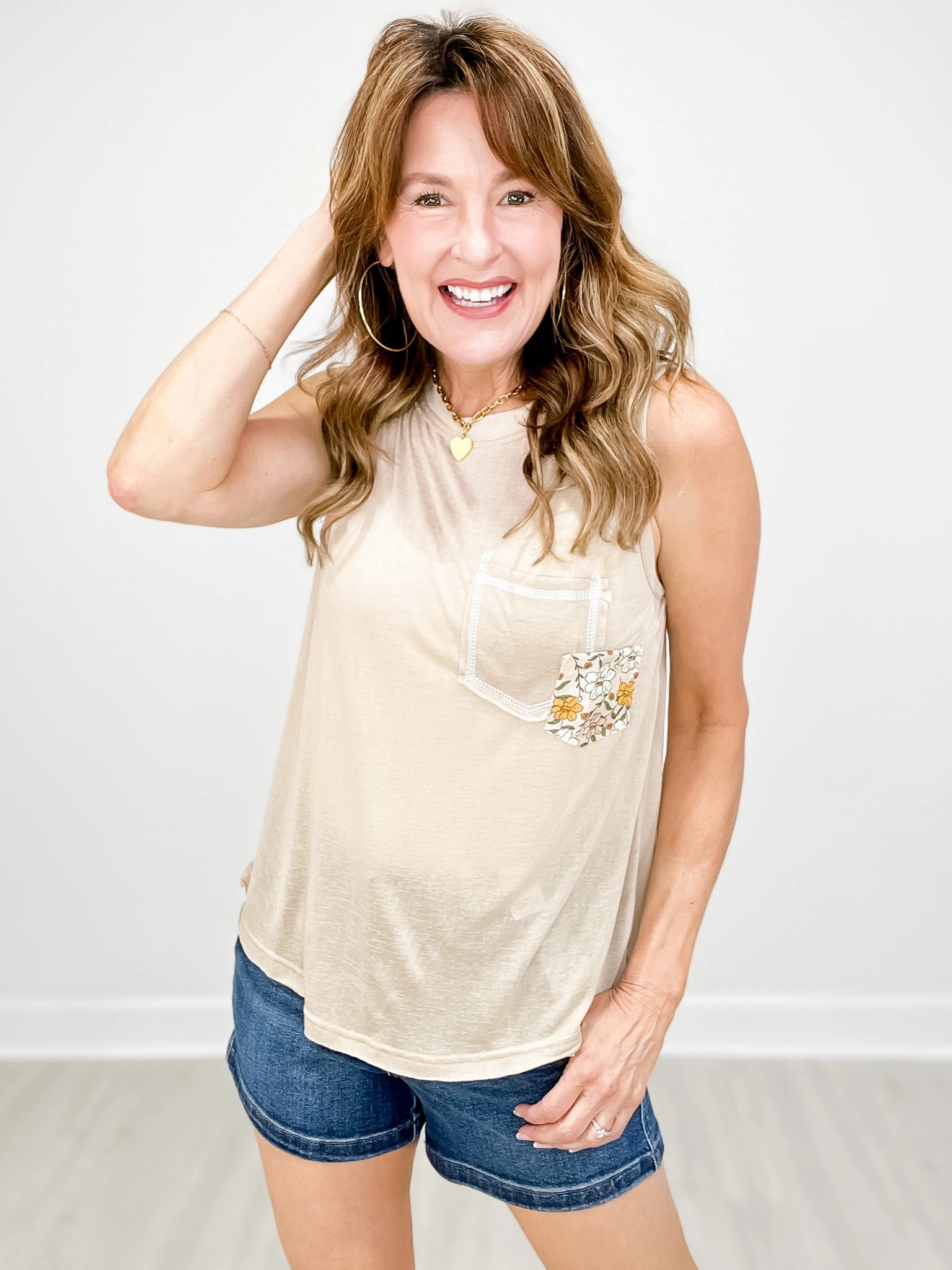 Round Neck Sleeveless Front Pocket Solid Knit Top FeatherlightConstruction