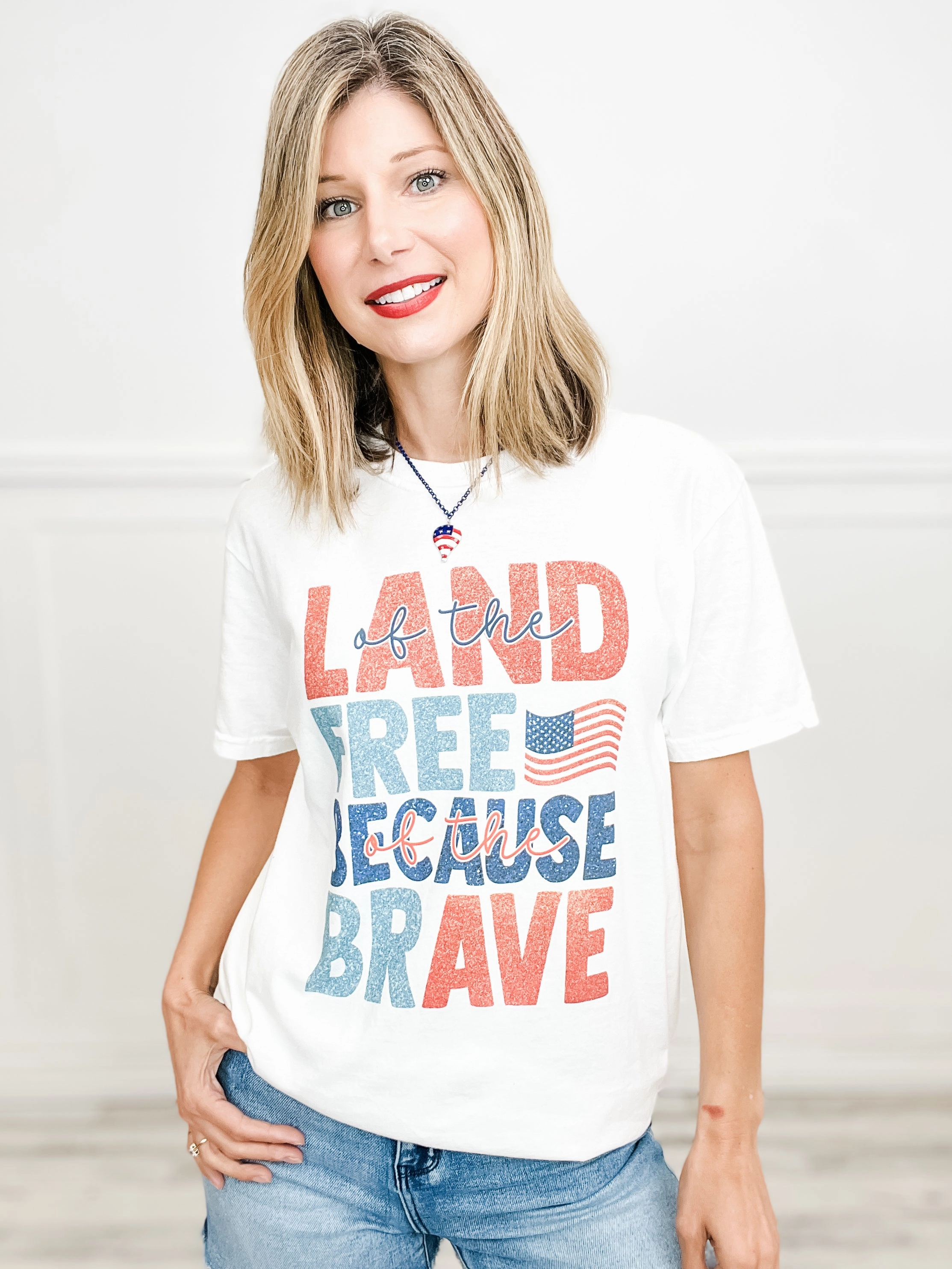 RelaxedSilhouette Land of The Free Because of The Brave Graphic Tee